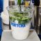 Fresh matcha being poured into a Portcha iced matcha latte